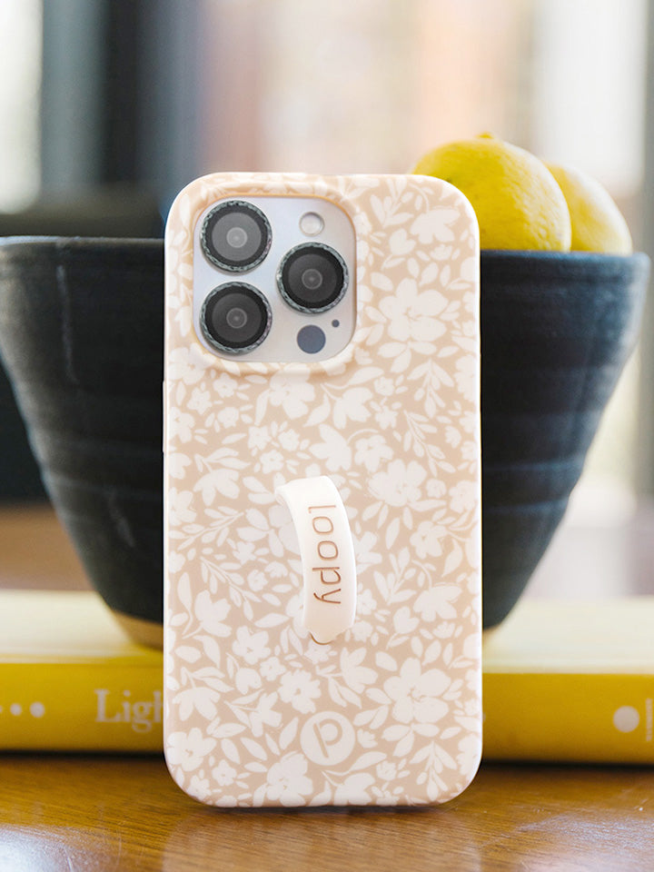 A Beige Blossoms Loopy Case.|| feature-media