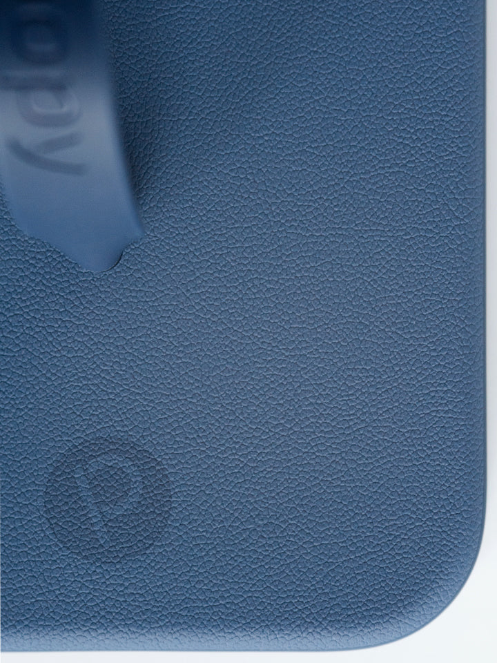 A close up of the pebble texture on a Denim Loopy Case. || feature-media