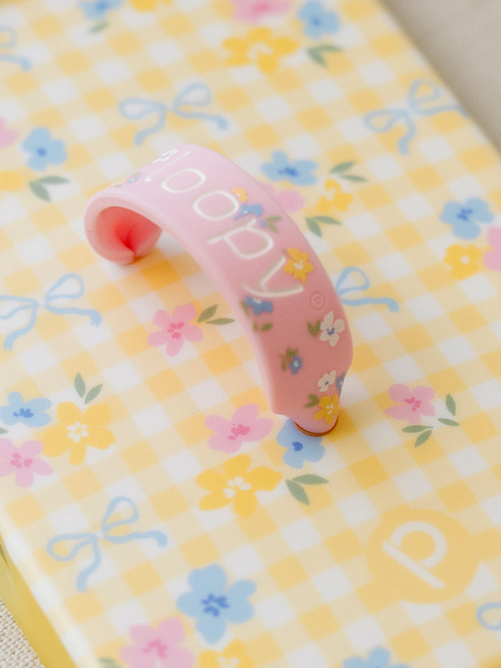 A close up of the Super Loop that comes with the Buttercup Blossom Loopy Case. || feature-media