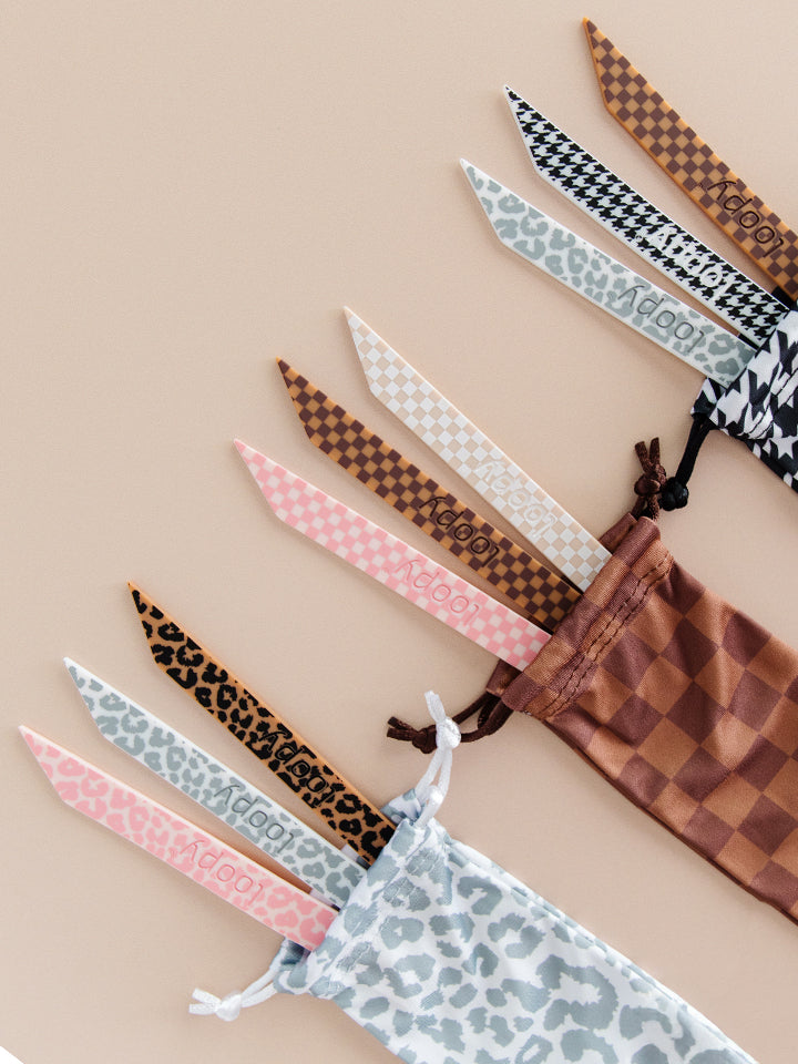 A Neutral Leopard, Neutral Checkered, and Neutral Mixed Loopy Cases Loop Pack.