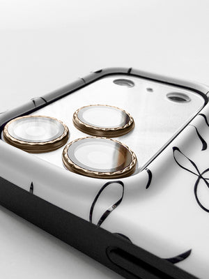 A close up of a Loopy Cases Clear with Diamond Desert Titanium Full Camera Tempered Glass. || feature-media