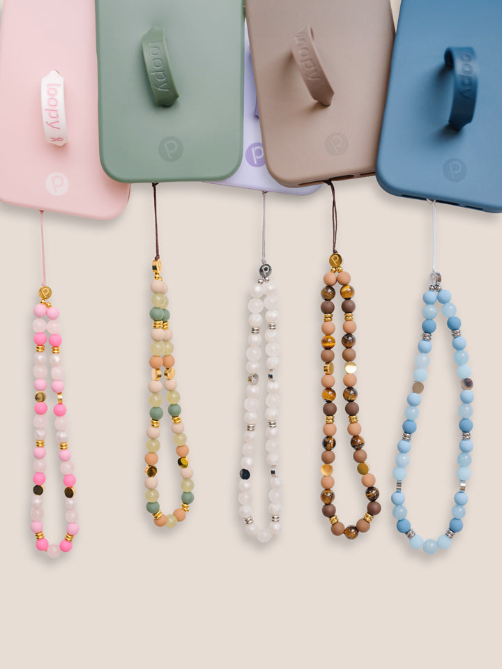 Six Loopy Cases Wristlets attached to six Loopy Cases.