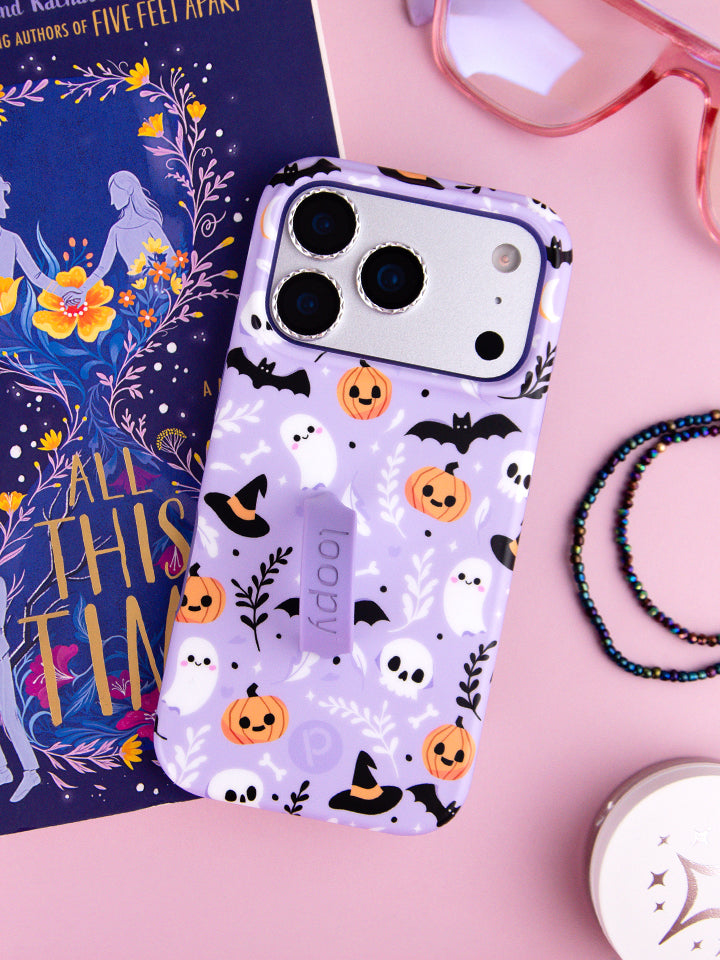 Boo Crew Loopy Case with a book, glasses, and jewelry || feature-media
