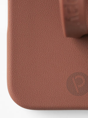 A close up of the pebble texture on a Cappuccino Loopy Case. || feature-media