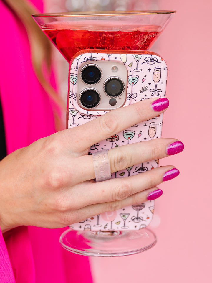 A woman holding a Fizzy Fun Cocktails Loopy Case. || feature-media