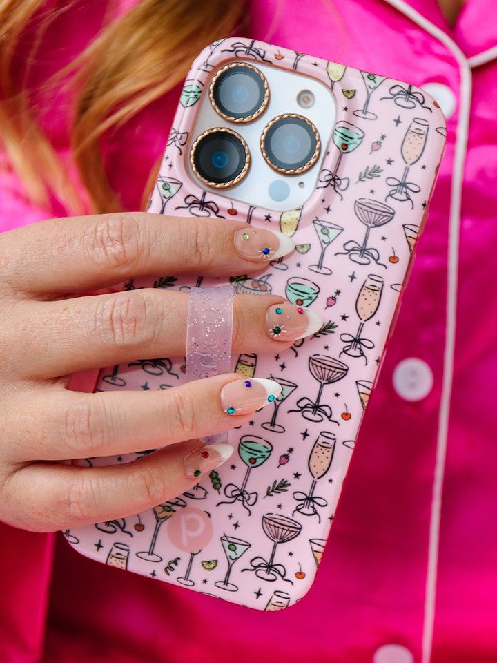 A woman holding a Fizzy Fun Cocktails Loopy Case. || feature-media