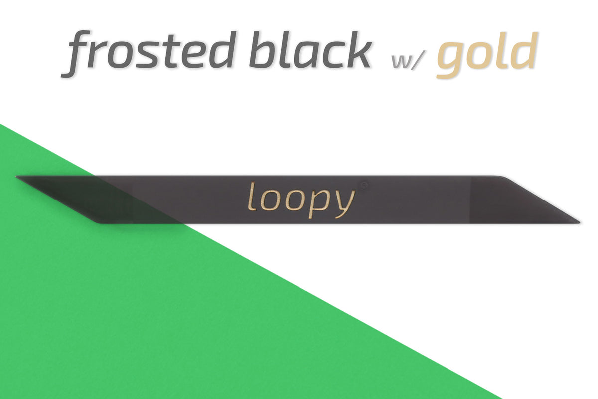 https://www.loopycases.com/cdn/shop/files/frosted-black-w-gold-loop_1200x.jpg?v=1712169248