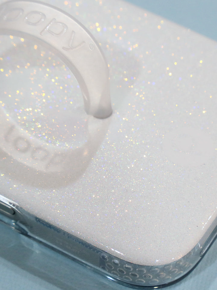 A close up of the sparkle on a White Shimmer Loopy Case. || feature-media
