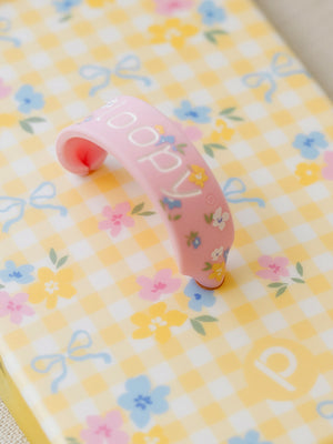 A close up of the Super Loop that comes with the Buttercup Blossom Loopy Case. || feature-media