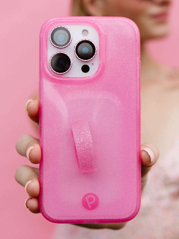 A woman holding a Clear Sparkle Pink Loopy Case. || feature-media