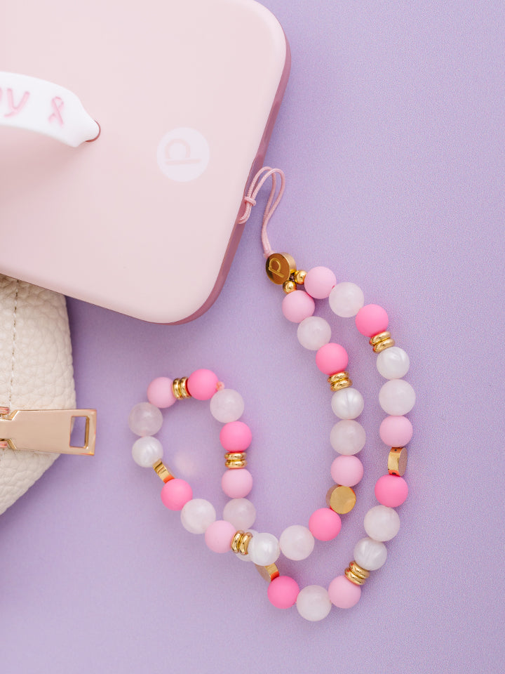 A Posh Pink Loopy Cases Wristlet attached to a Blush Loopy Case.