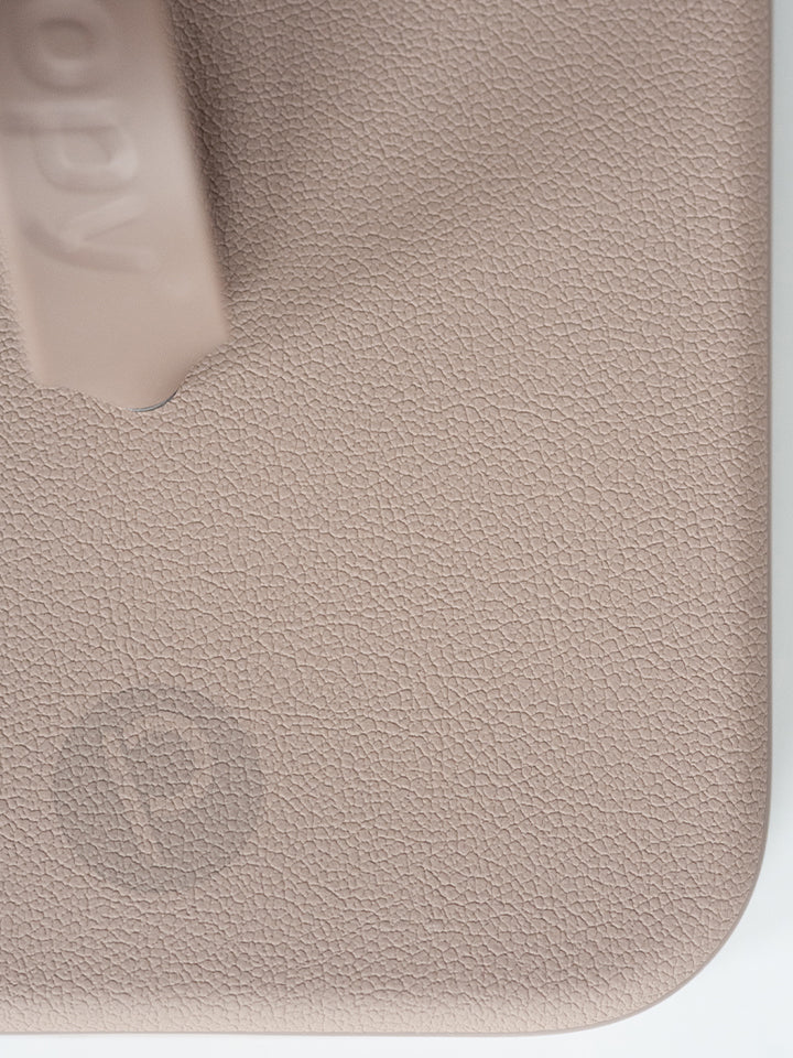 A close up of the pebble texture on a Stone Loopy Case. || feature-media