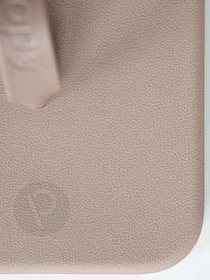 A close up of the pebble texture on a Stone Loopy Case. || feature-media