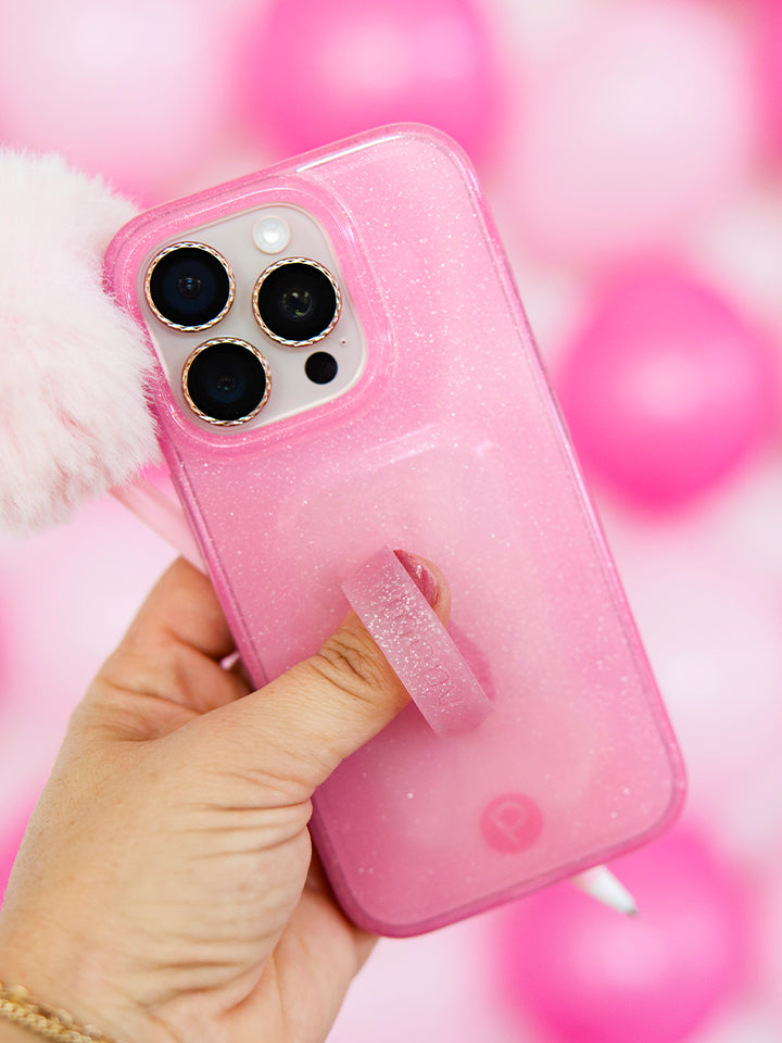 A woman holding a Clear Sparkle Pink Loopy Case. || feature-media