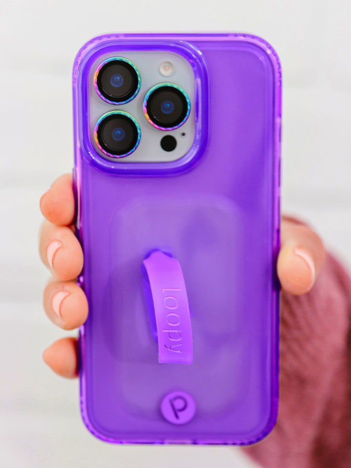 A woman holding a Clear Neon Purple Loopy Case. || feature-media
