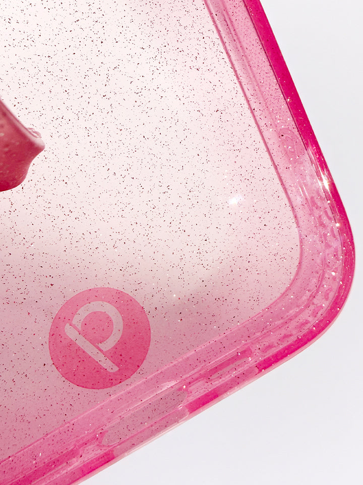 A closeup of the Clear Sparkle Pink Loopy Case.  || feature-media