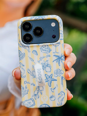 A woman holding a Limoncello Stripes Loopy Case. || feature-media