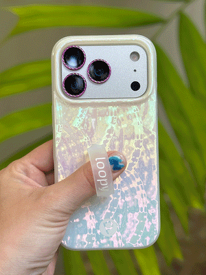 A GIF showing the iridescent effect on a Sunkissed Shores Loopy Case. || feature-media