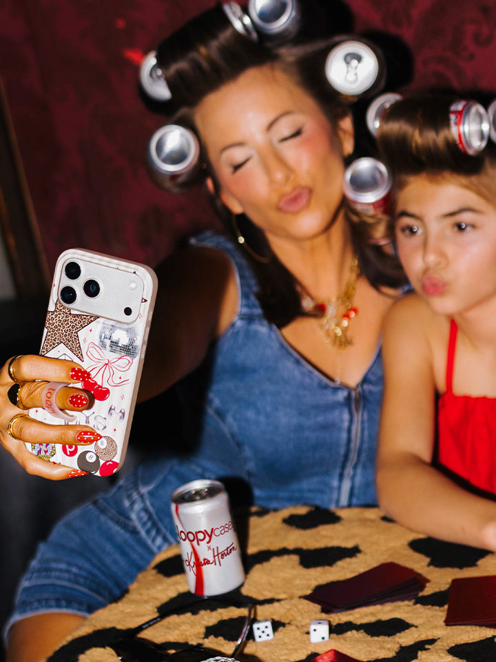 Krista Horton taking a selfie while using a Lucky Girl Club Loopy Case. || feature-media
