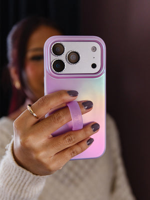 A woman holding a Lavender Pearl Loopy Case. || feature-media